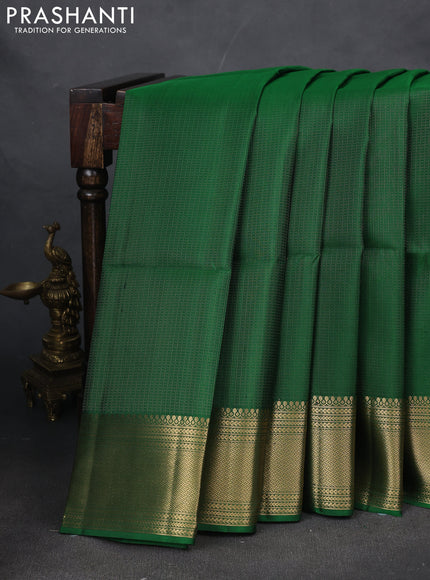 Pure soft silk saree green with allover zari weaves and zari woven border