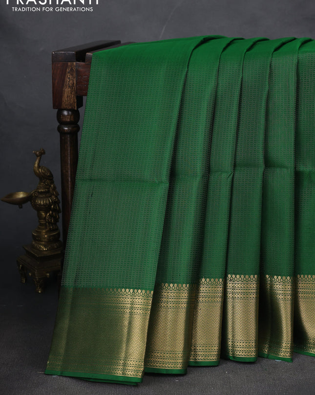 Pure soft silk saree green with allover zari weaves and zari woven border