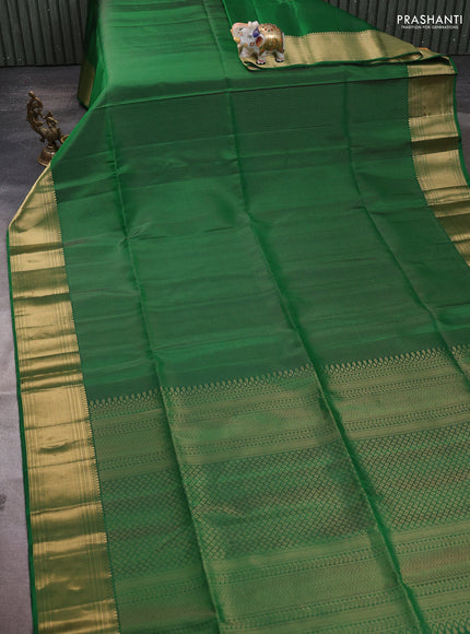 Pure soft silk saree green with allover zari weaves and zari woven border