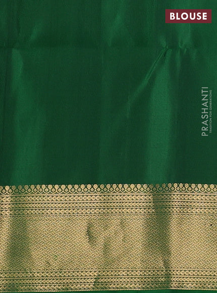 Pure soft silk saree green with allover zari weaves and zari woven border