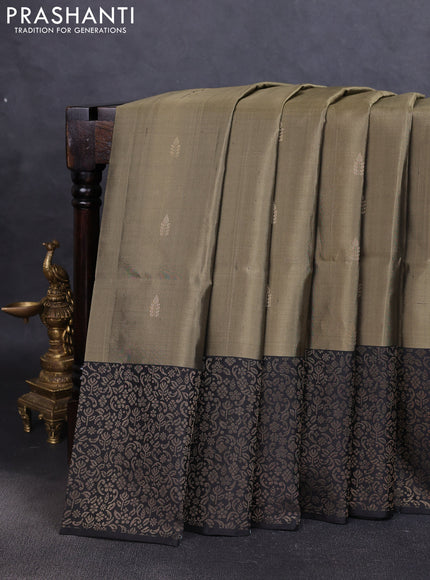 Pure soft silk saree elaichi green and black with zari woven buttas and zari woven border