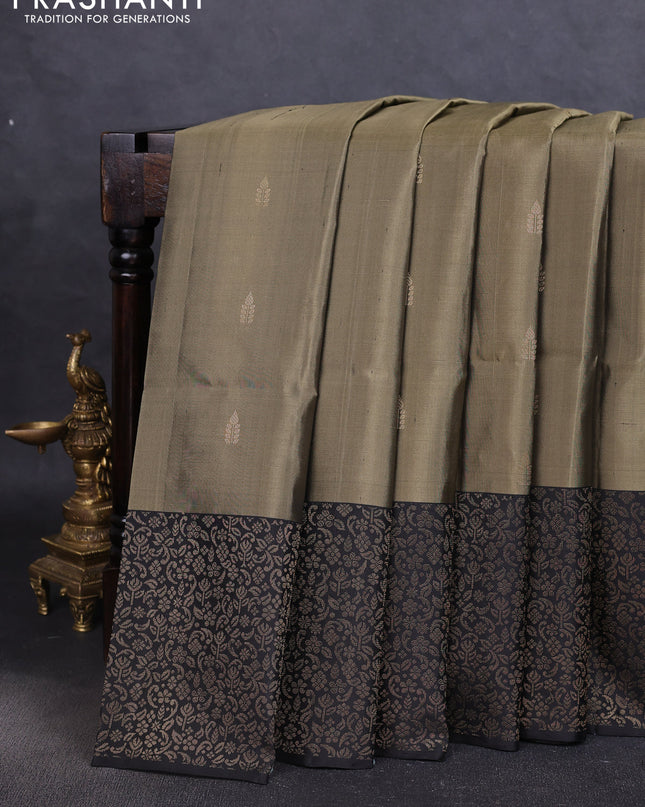 Pure soft silk saree elaichi green and black with zari woven buttas and zari woven border