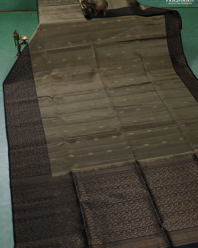 Pure soft silk saree elaichi green and black with zari woven buttas and zari woven border
