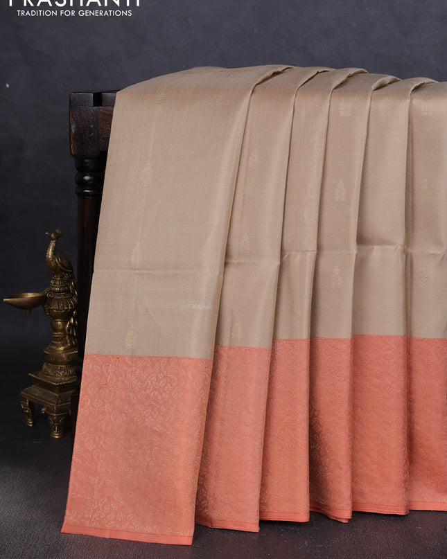 Pure soft silk saree beige and pale orange with zari woven buttas and zari woven border