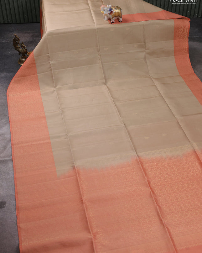 Pure soft silk saree beige and pale orange with zari woven buttas and zari woven border