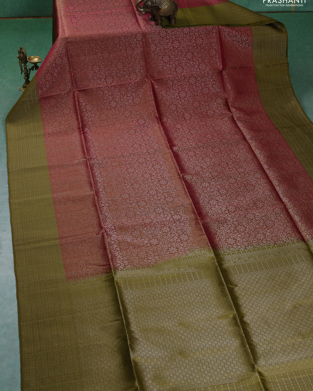Pure soft silk saree dual shade of pink and mehendi green with allover silver zari woven brocade weaves and zari woven border