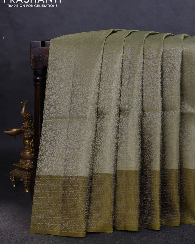 Pure soft silk saree pastel green and mehendi green with allover silver zari woven brocade weaves and zari woven border
