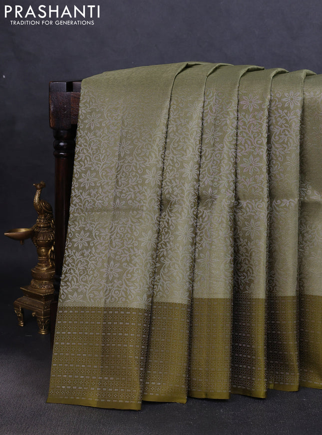 Pure soft silk saree pastel green and mehendi green with allover silver zari woven brocade weaves and zari woven border