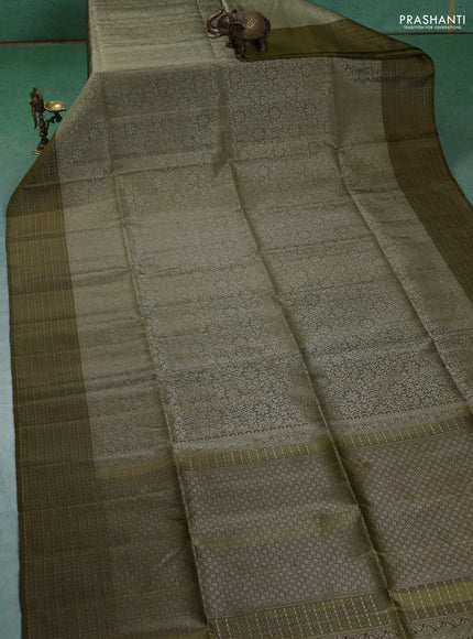 Pure soft silk saree pastel green and mehendi green with allover silver zari woven brocade weaves and zari woven border