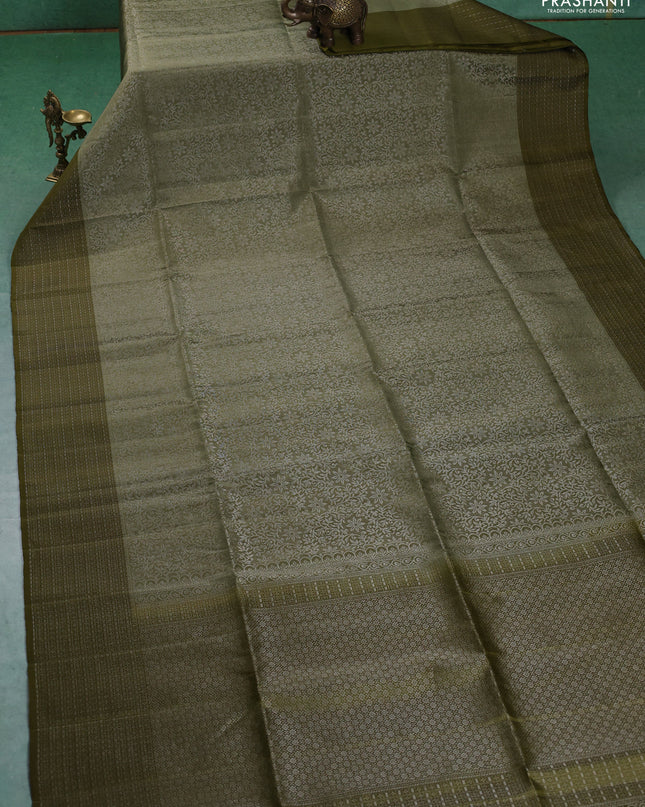 Pure soft silk saree pastel green and mehendi green with allover silver zari woven brocade weaves and zari woven border