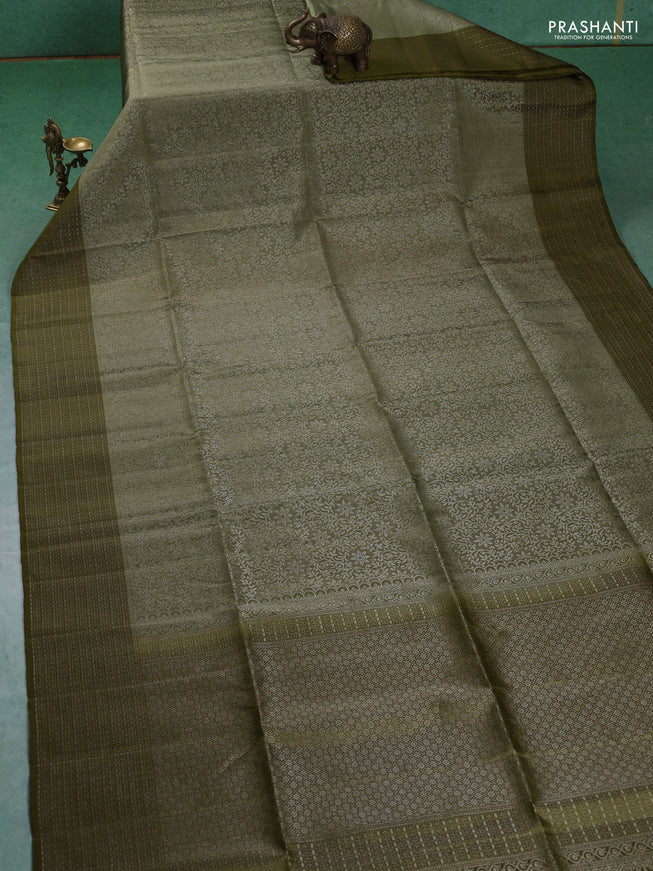 Pure soft silk saree pastel green and mehendi green with allover silver zari woven brocade weaves and zari woven border