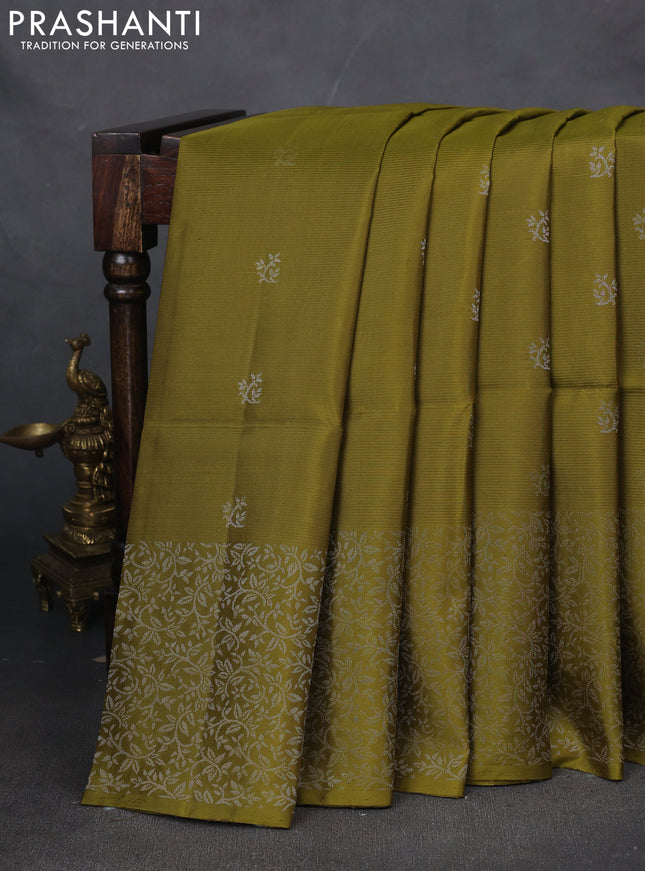 Pure soft silk saree mehendi green with silver zari woven buttas and zari woven border