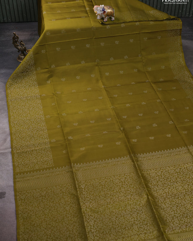 Pure soft silk saree mehendi green with silver zari woven buttas and zari woven border