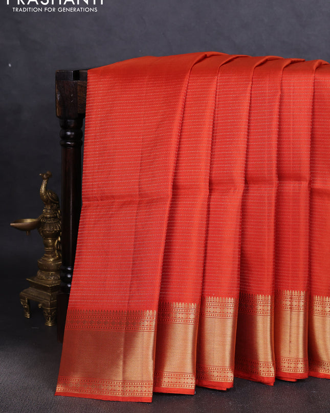 Pure soft silk saree orange with allover zari weaves and zari woven border