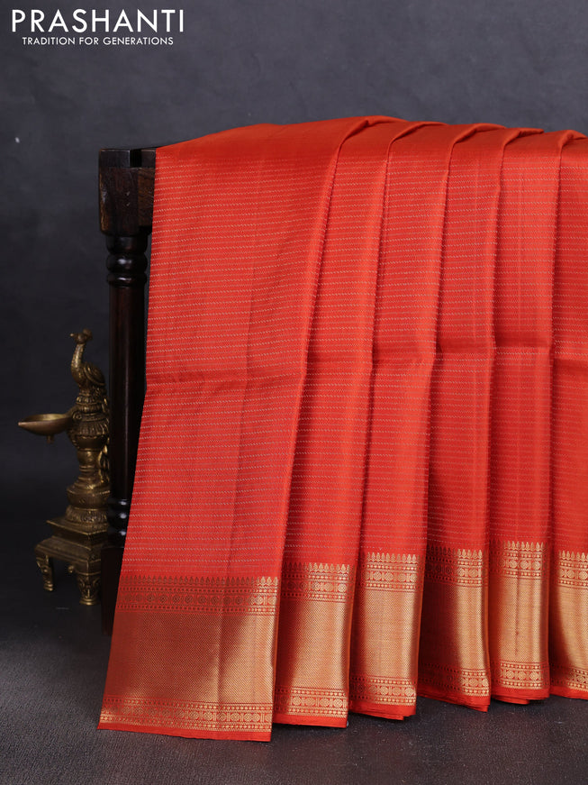 Pure soft silk saree orange with allover zari weaves and zari woven border