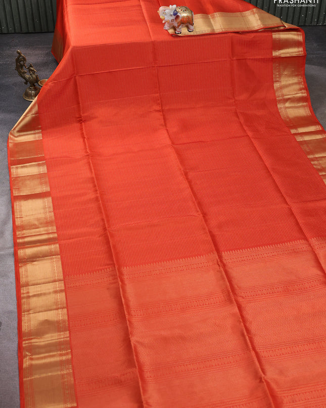 Pure soft silk saree orange with allover zari weaves and zari woven border