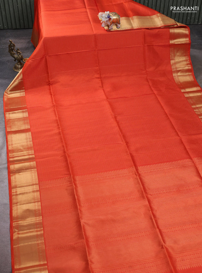 Pure soft silk saree orange with allover zari weaves and zari woven border