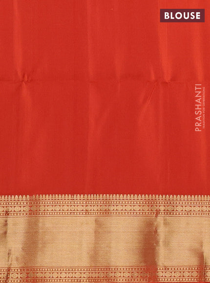 Pure soft silk saree orange with allover zari weaves and zari woven border