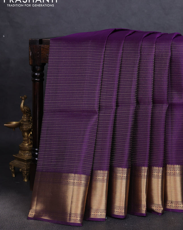 Pure soft silk saree violet with allover zari weaves and zari woven border