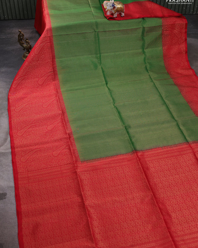 Pure soft silk saree green and red with allover zari woven brocade weaves and zari woven border
