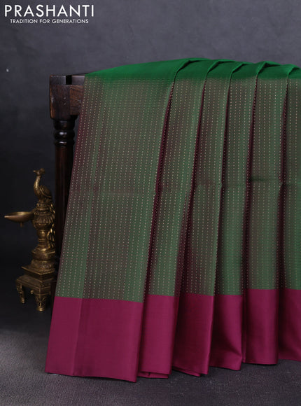 Pure soft silk saree green and purple with allover zari weaves and simple border