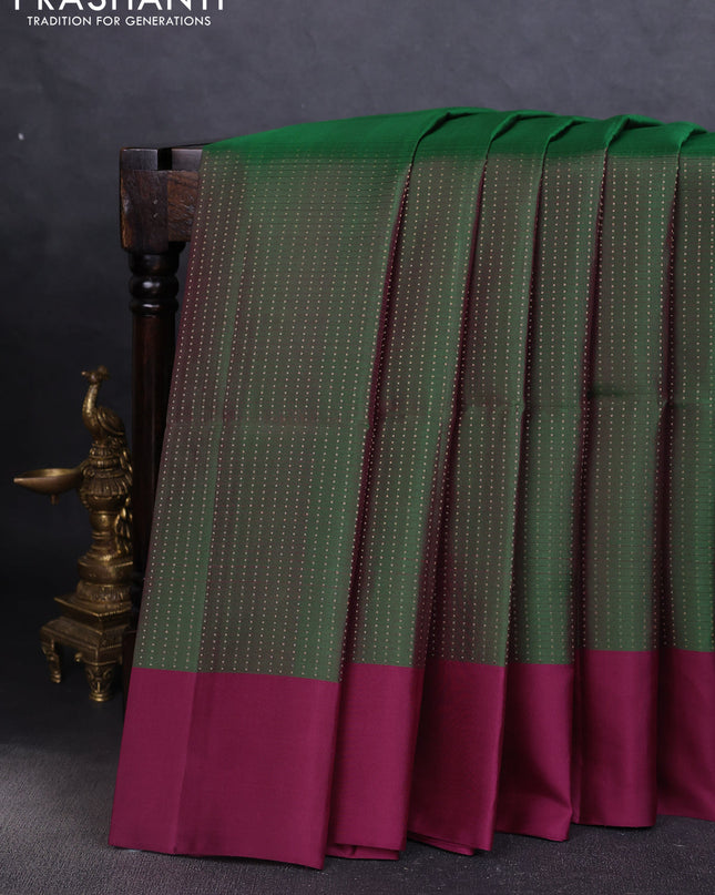 Pure soft silk saree green and purple with allover zari weaves and simple border