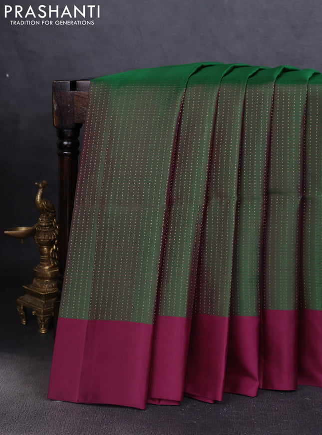 Pure soft silk saree green and purple with allover zari weaves and simple border
