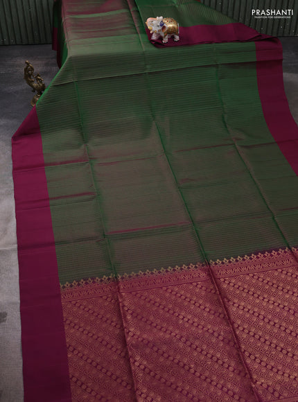 Pure soft silk saree green and purple with allover zari weaves and simple border
