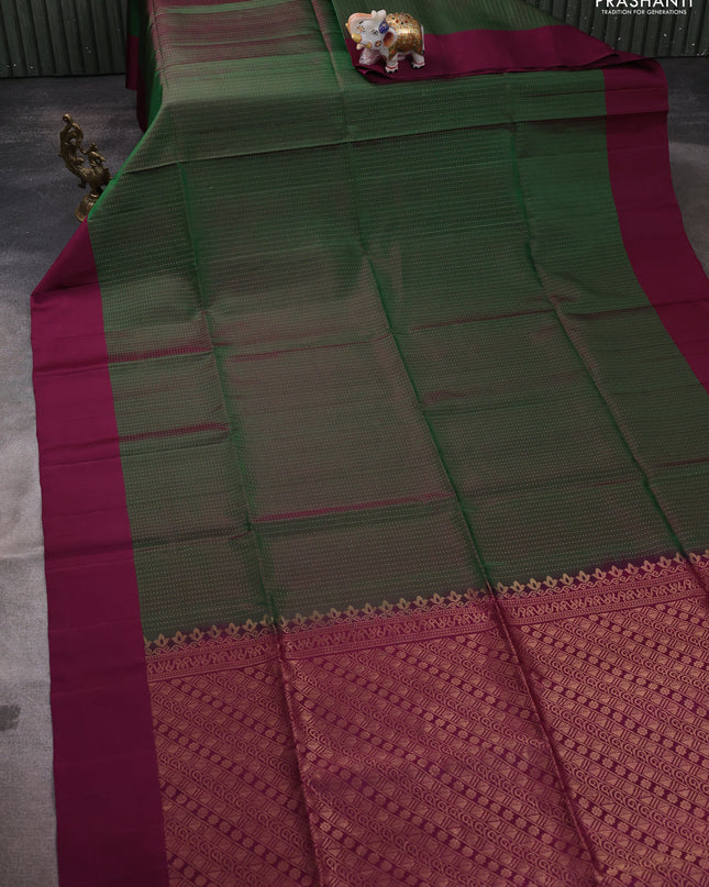 Pure soft silk saree green and purple with allover zari weaves and simple border
