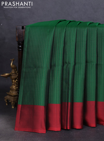 Pure soft silk saree green and maroon with allover zari weaves and simple border