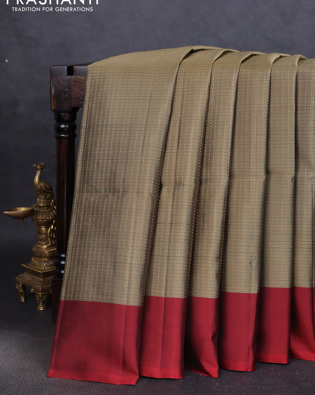 Pure soft silk saree chikku shade and maroon with allover zari weaves and simple border