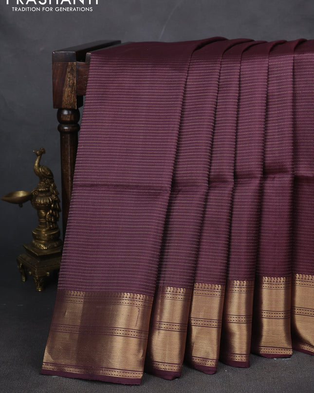 Pure soft silk saree wine shade with allover zari weaves and zari woven border