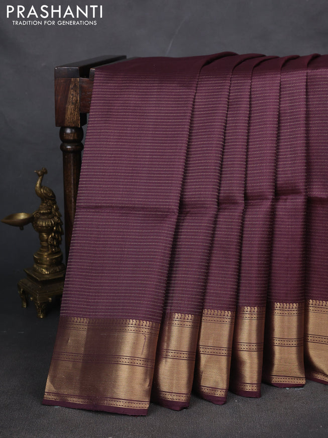 Pure soft silk saree wine shade with allover zari weaves and zari woven border