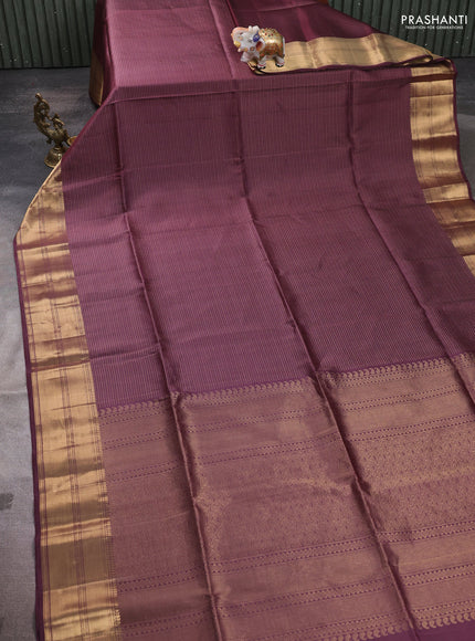 Pure soft silk saree wine shade with allover zari weaves and zari woven border