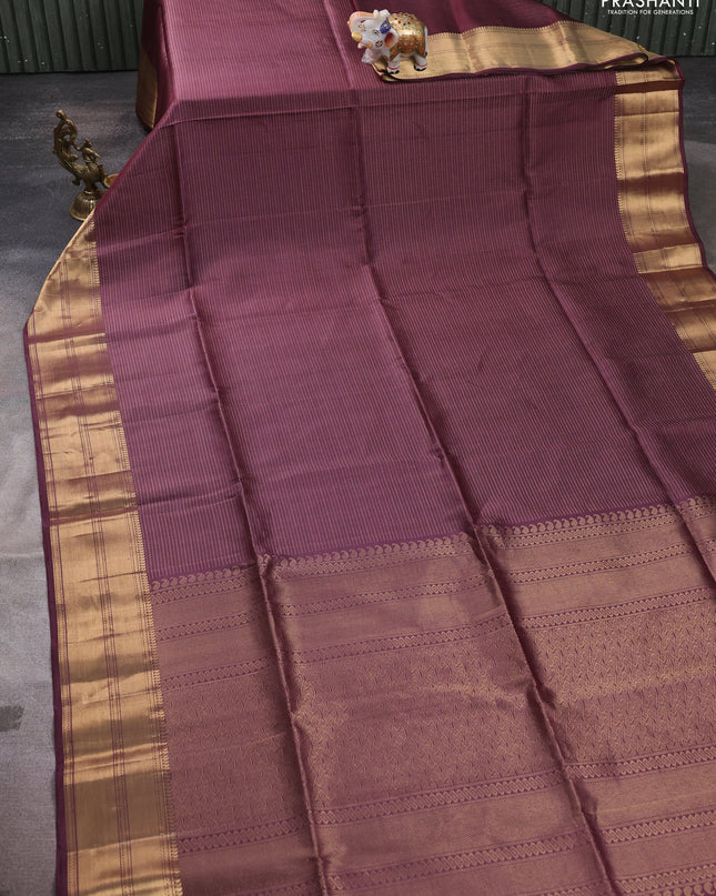 Pure soft silk saree wine shade with allover zari weaves and zari woven border