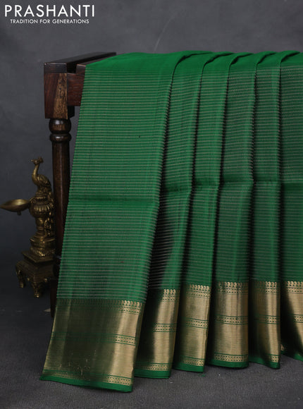 Pure soft silk saree green with allover zari weaves and zari woven border