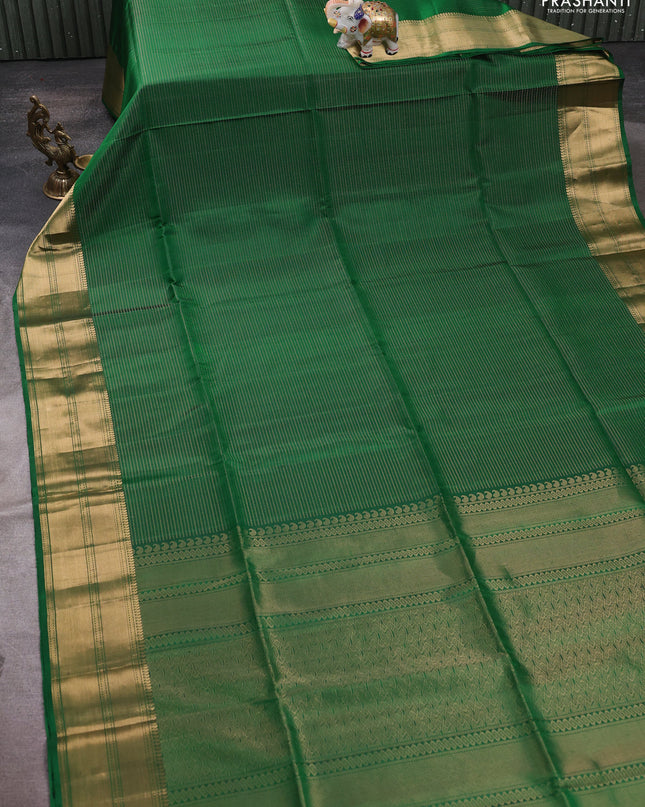 Pure soft silk saree green with allover zari weaves and zari woven border
