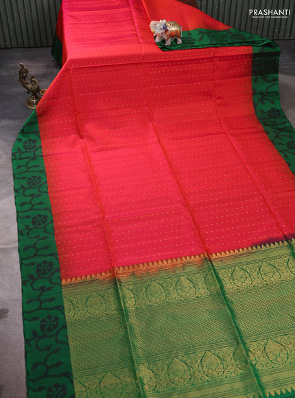 Pure soft silk saree dual shade of pinkish orange and green with zari woven buttas and ikat style border