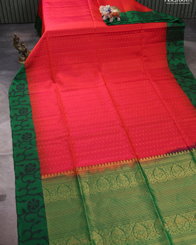 Pure soft silk saree dual shade of pinkish orange and green with zari woven buttas and ikat style border
