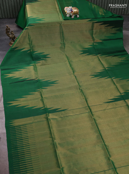 Pure soft silk saree green with allover zari weaves and temple design border