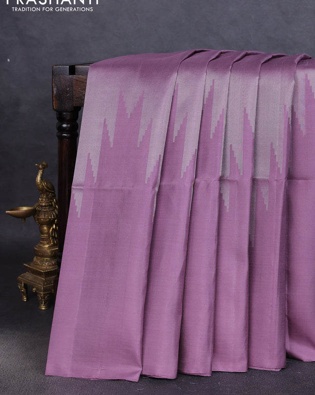 Pure soft silk saree pastel lavender with allover zari weaves and temple design border