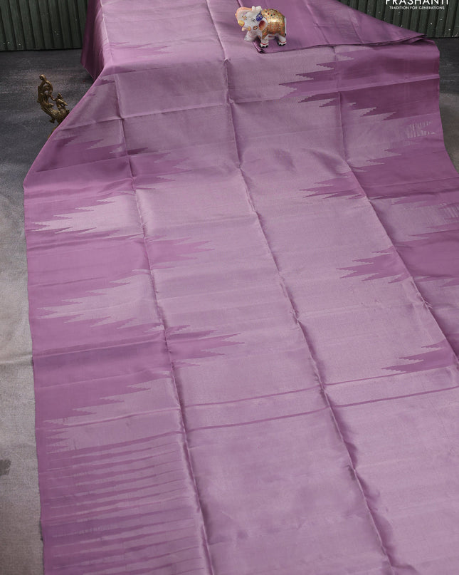 Pure soft silk saree pastel lavender with allover zari weaves and temple design border
