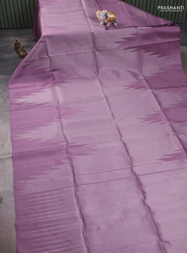 Pure soft silk saree pastel lavender with allover zari weaves and temple design border