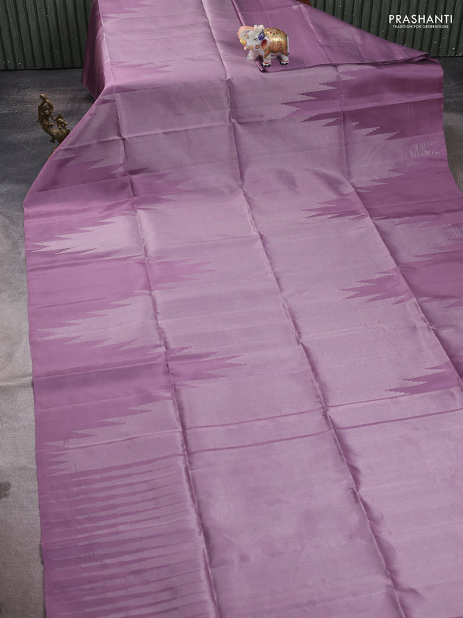 Pure soft silk saree pastel lavender with allover zari weaves and temple design border