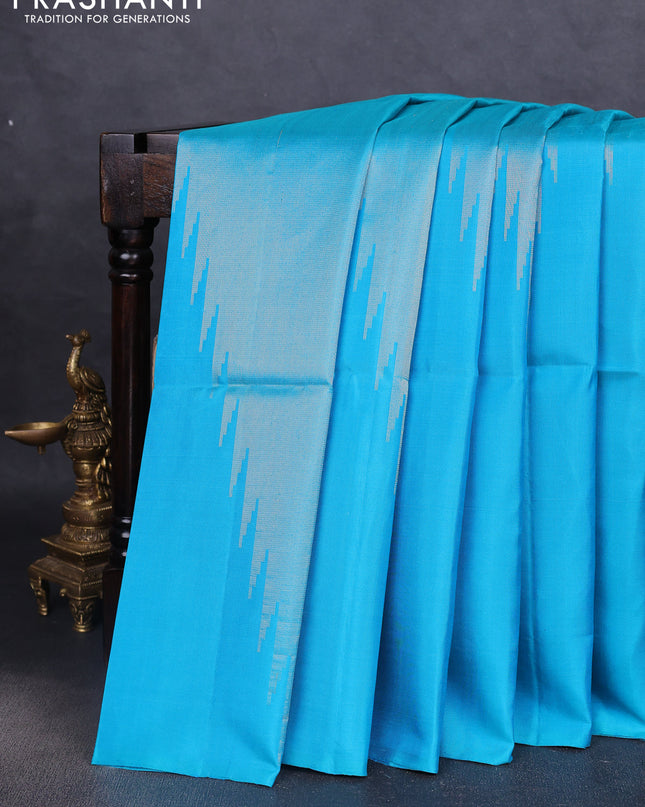 Pure soft silk saree light blue with allover zari weaves and temple design border