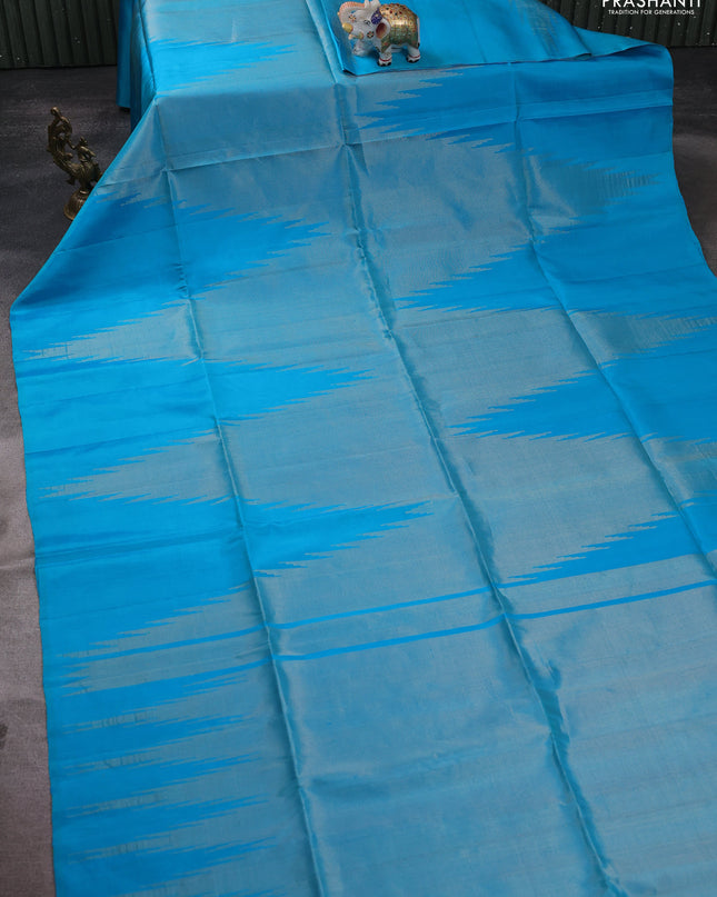 Pure soft silk saree light blue with allover zari weaves and temple design border