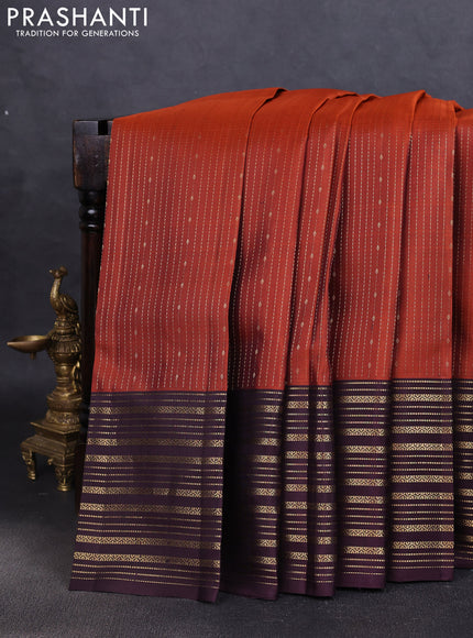 Pure soft silk saree rustic orange and deep wine with allover zari weaves and zari woven border