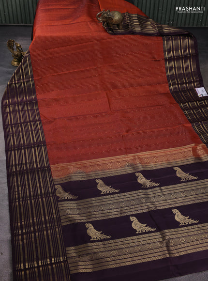Pure soft silk saree rustic orange and deep wine with allover zari weaves and zari woven border