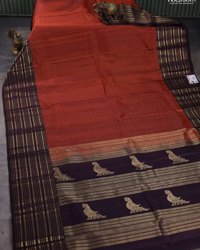Pure soft silk saree rustic orange and deep wine with allover zari weaves and zari woven border