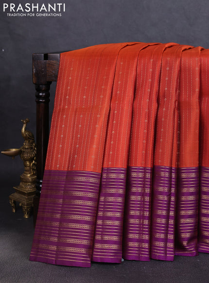 Pure soft silk saree rustic orange and purple with allover zari weaves and zari woven border